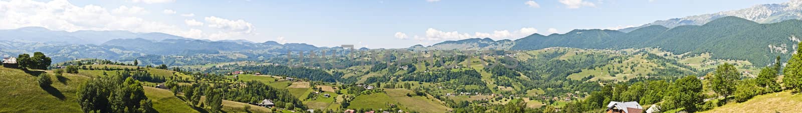 Panorama background in Carpathians. Beautiful mountains and landscape in Romania.