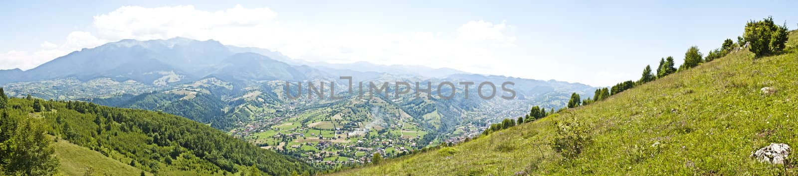 Panorama background in Carpathians. Beautiful mountains and landscape in Romania.