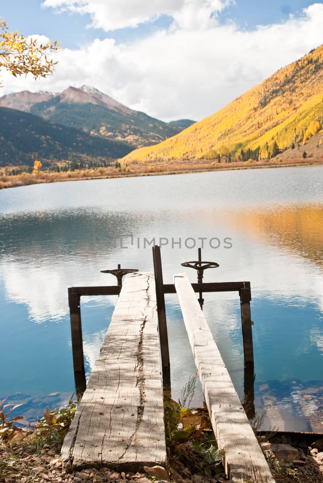 Autumnal Lake Vista by emattil