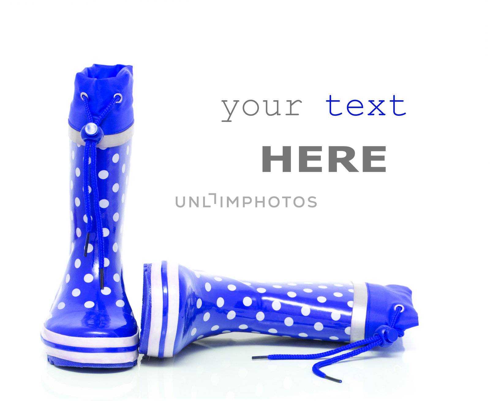 Blue rubber boots for kids isolated on white background (with space for text)