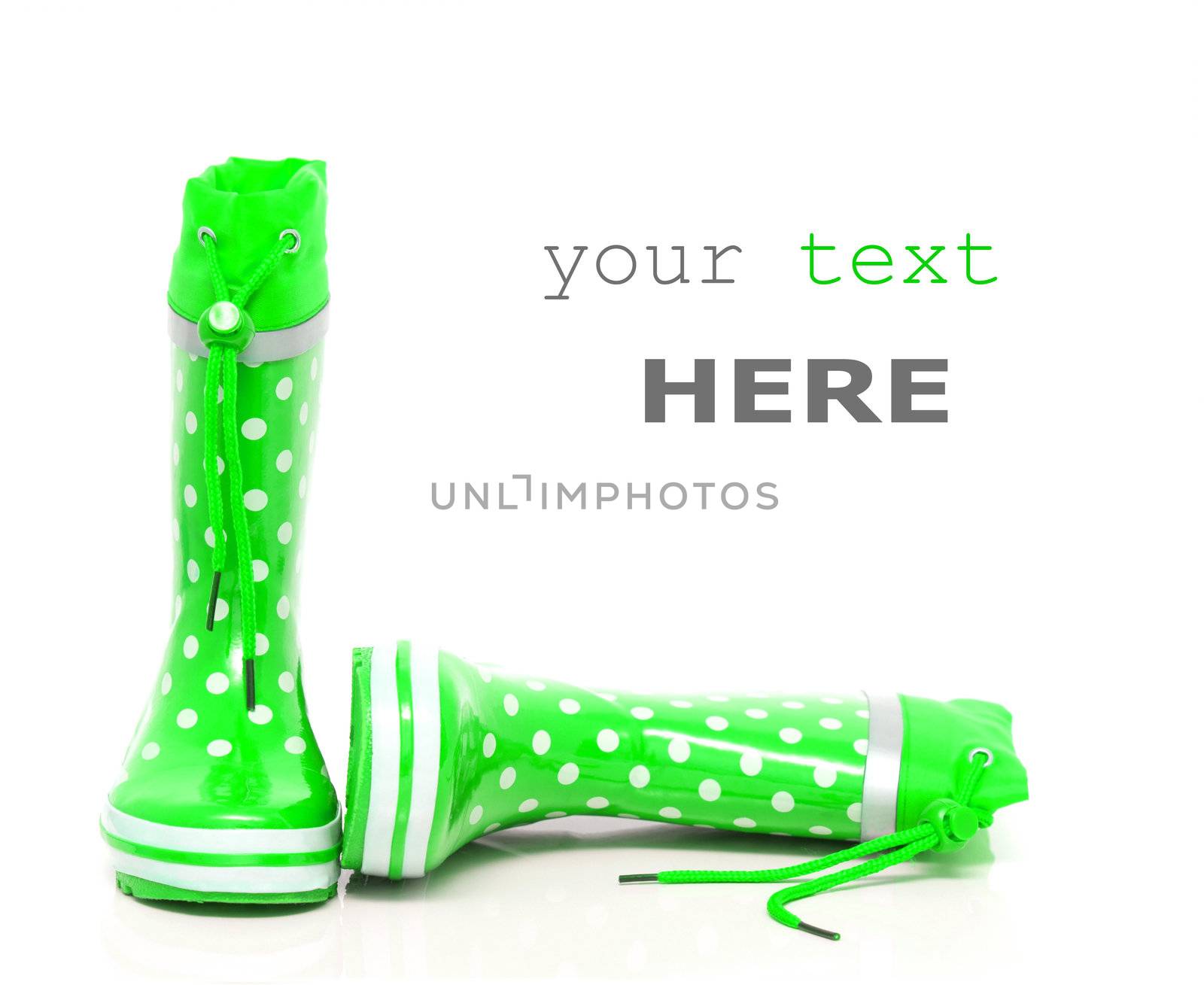 Green rubber boots for kids isolated on white background (with space for text)