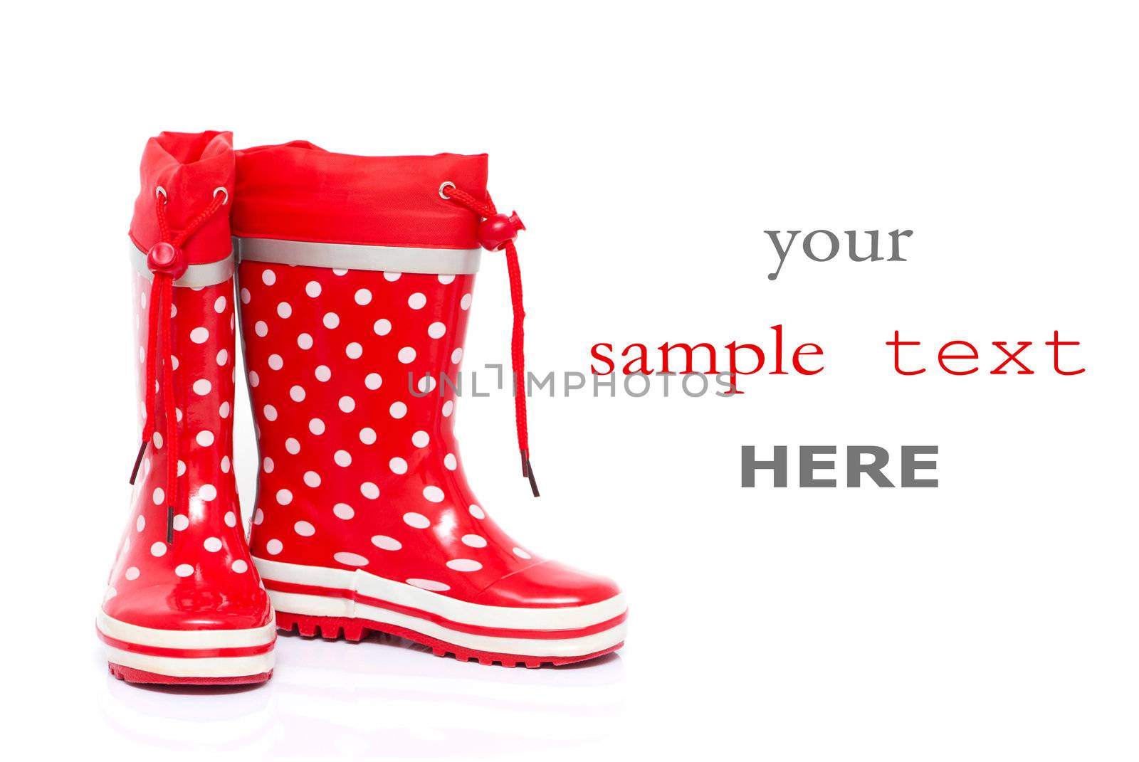 Red rubber boots for kids isolated on white background (with space for text)