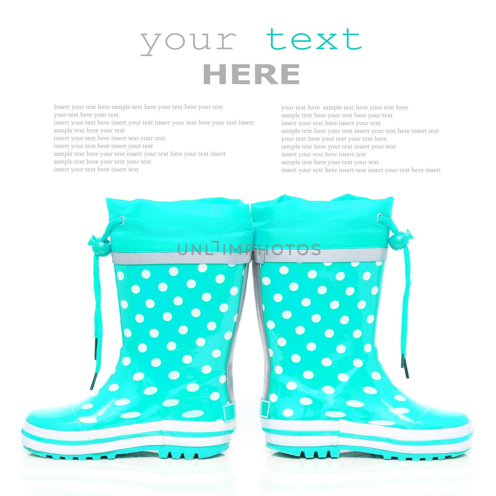 Cyan rubber boots for kids isolated on white background (with sample text)