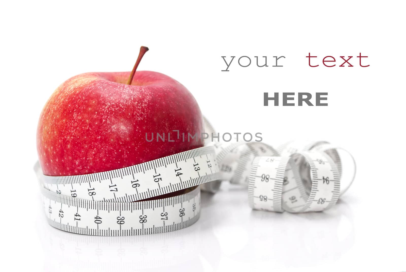 Red apple and tape measure isolated on white (with sample text)