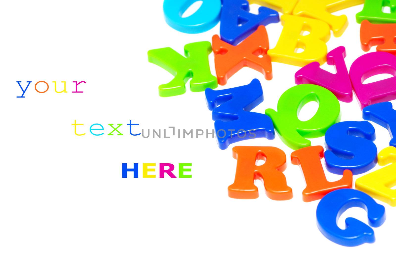 Colorful magnet letters isolated on white background (with space for sample text)