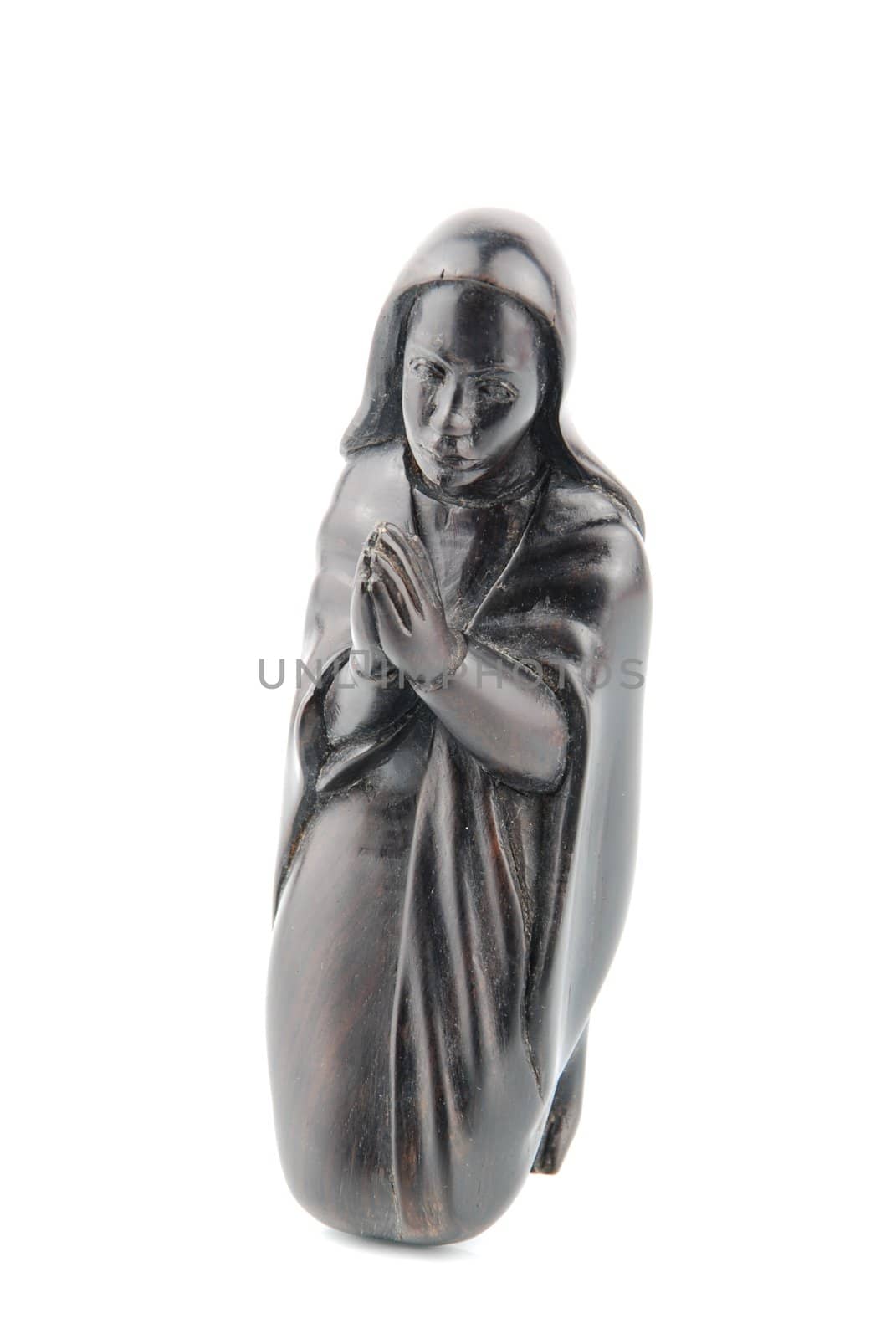 religious blackwood figurine of Virgin Mary isolated on white background