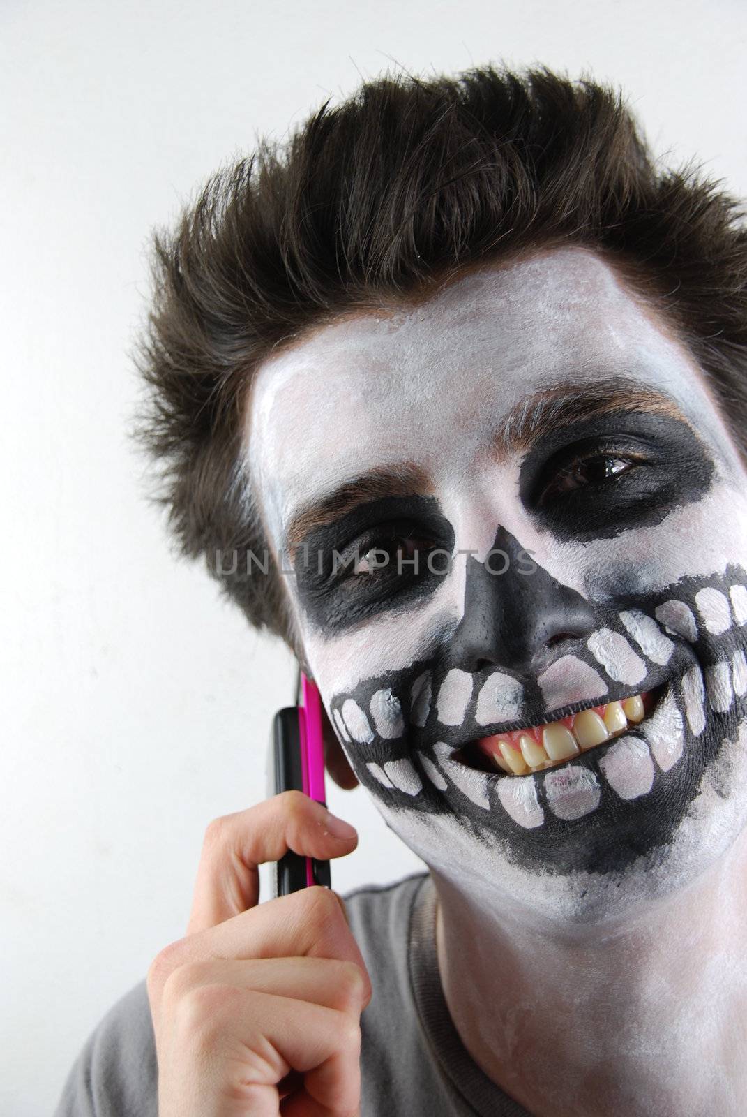 Skeleton guy talking on mobile phone by luissantos84