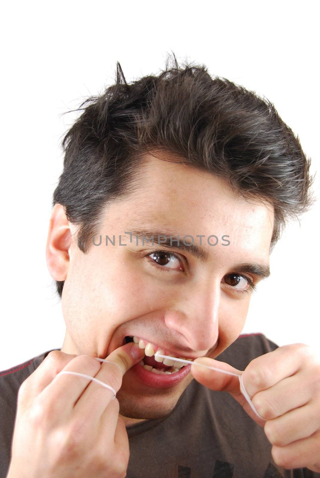 Man flossing his teeth by luissantos84