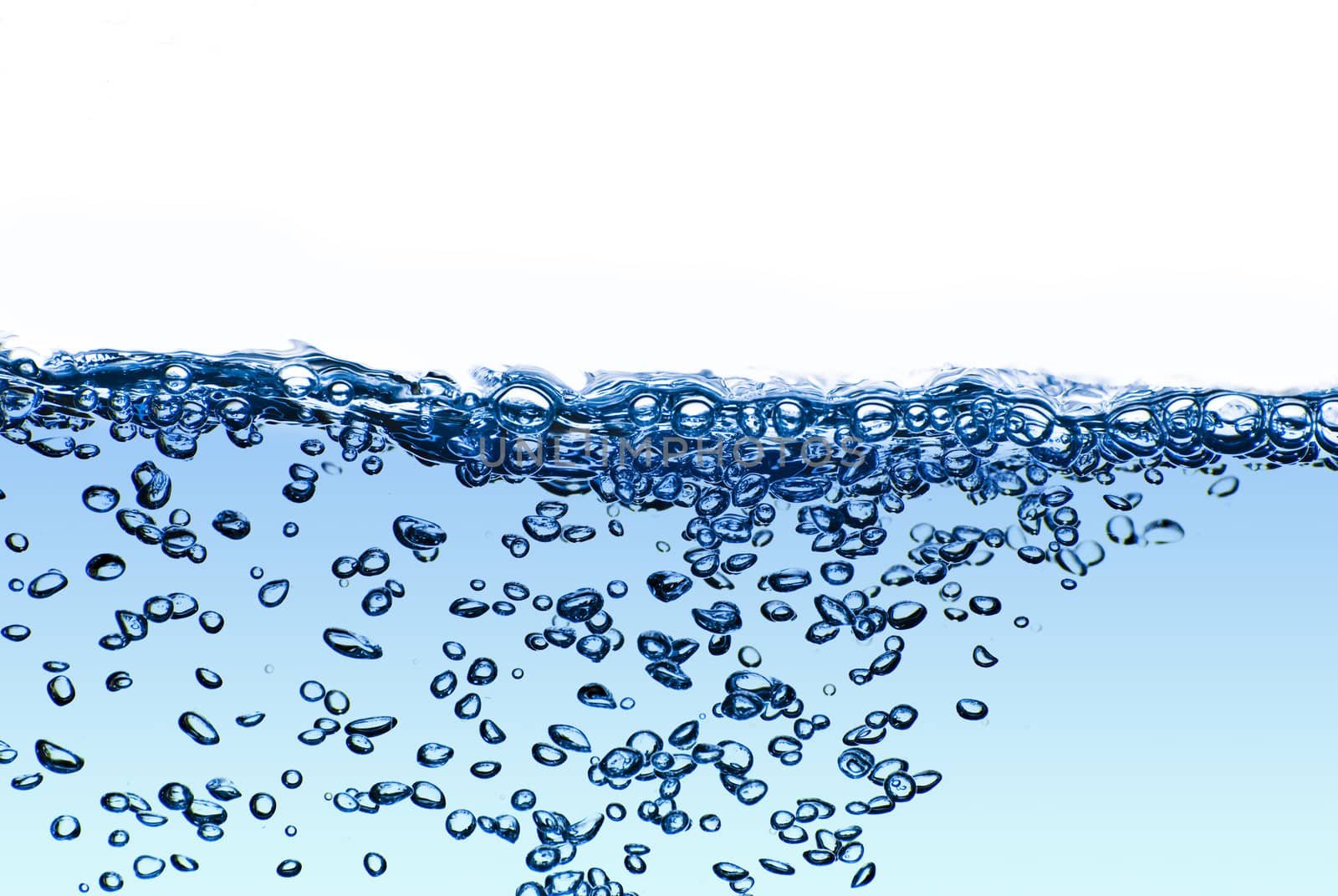 Isolated blue water splashing with bubbles and water drops - abstract blue background environmental theme