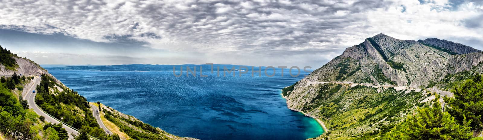  Scenic panorama view of the mountains, clouds and sea in Croatia. HDR nature background.