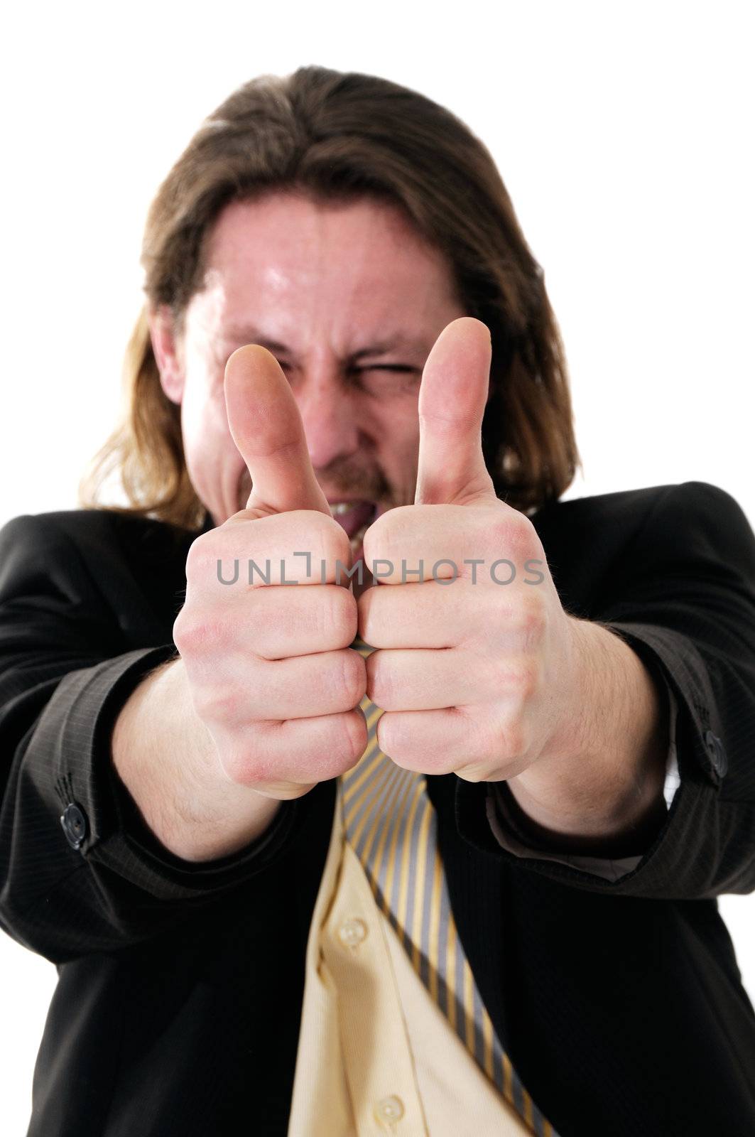 Young successful businessman with thumbs up isolated on white background.