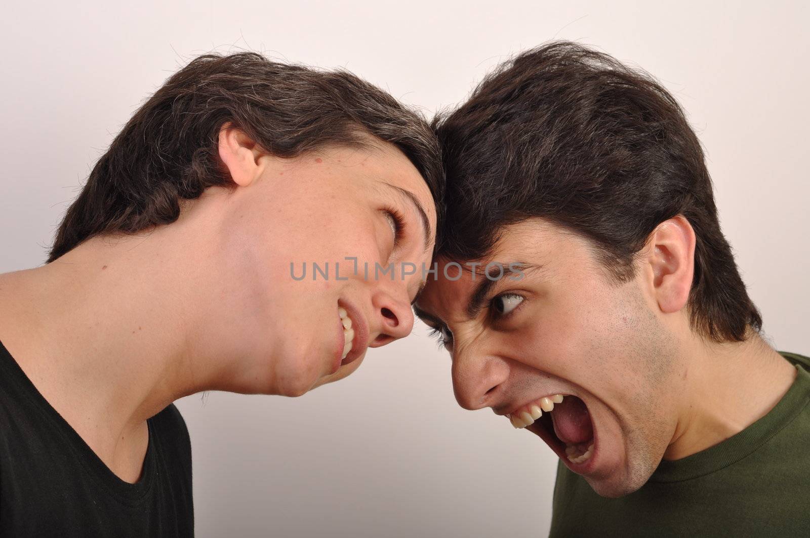 portrait of a woman and man yelling at each other