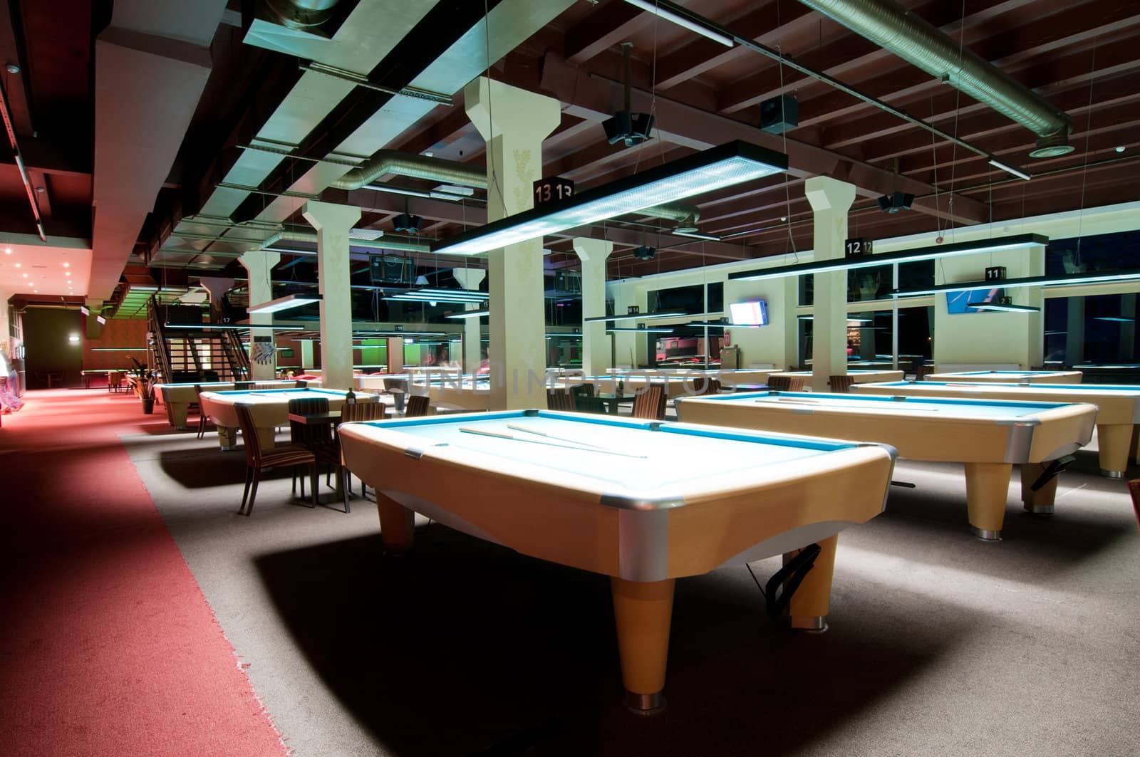 Shot of billiard room with tables, interior