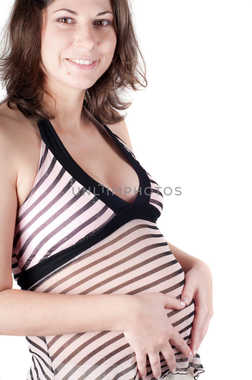 Pregnant woman hands in form of heart sign by anytka