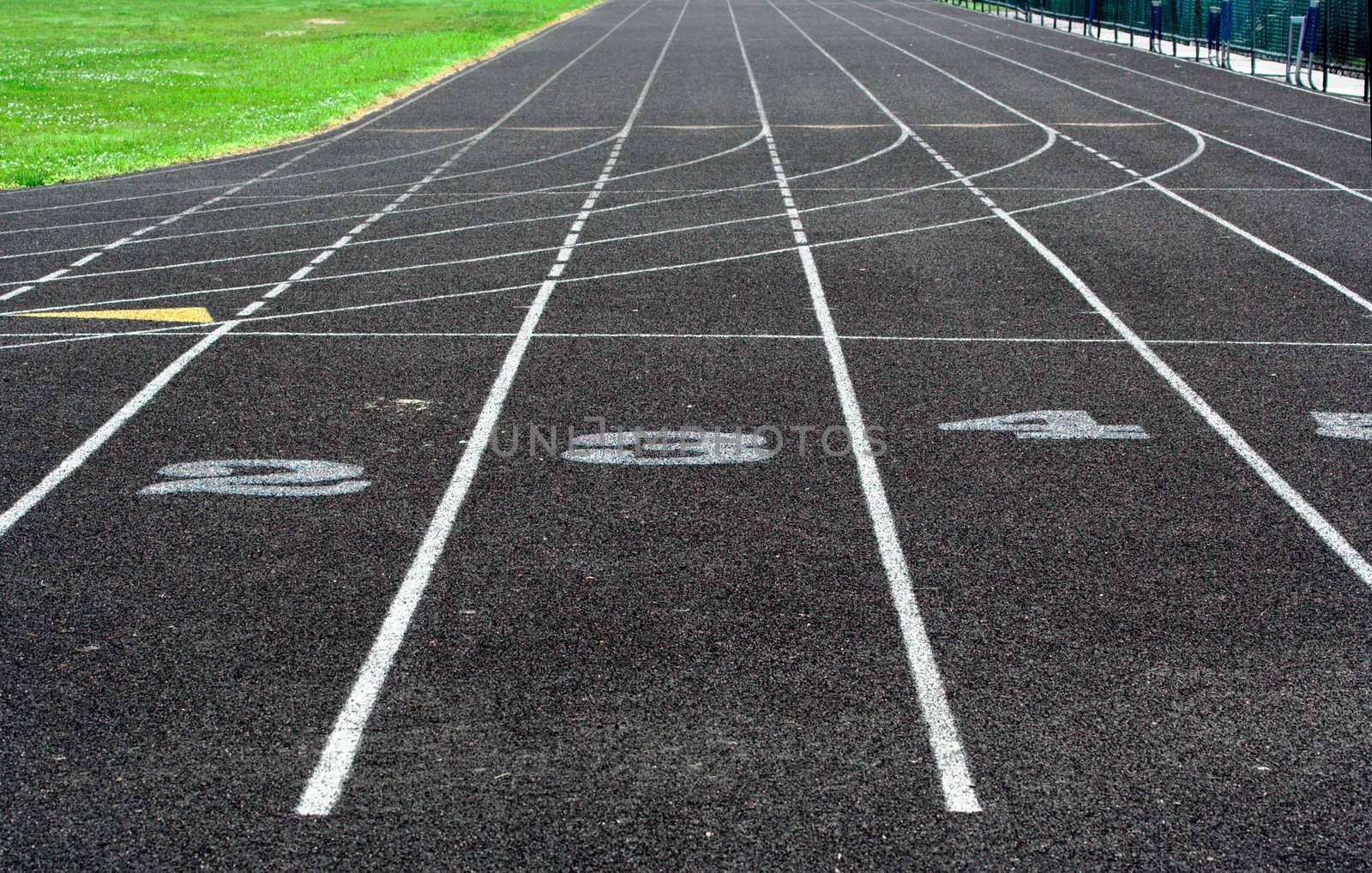 A portion of a track showing lane numbers 2, 3, and 4