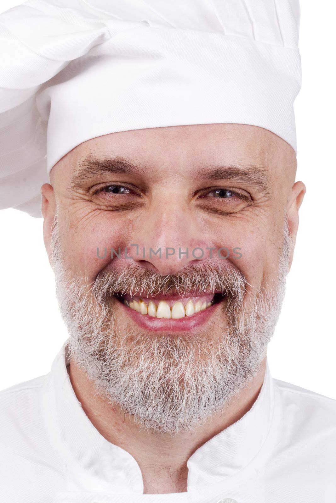 Portrait of a happy chef in a chef's hat.