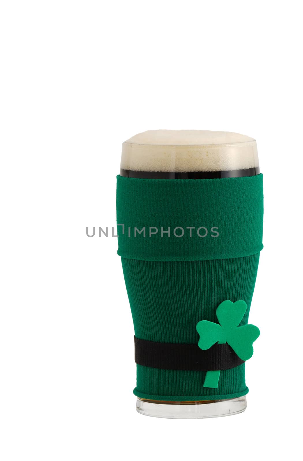 Full beer glass in green with black belt leprechaun suit for St Patrick day celebration decorated with shamrock 