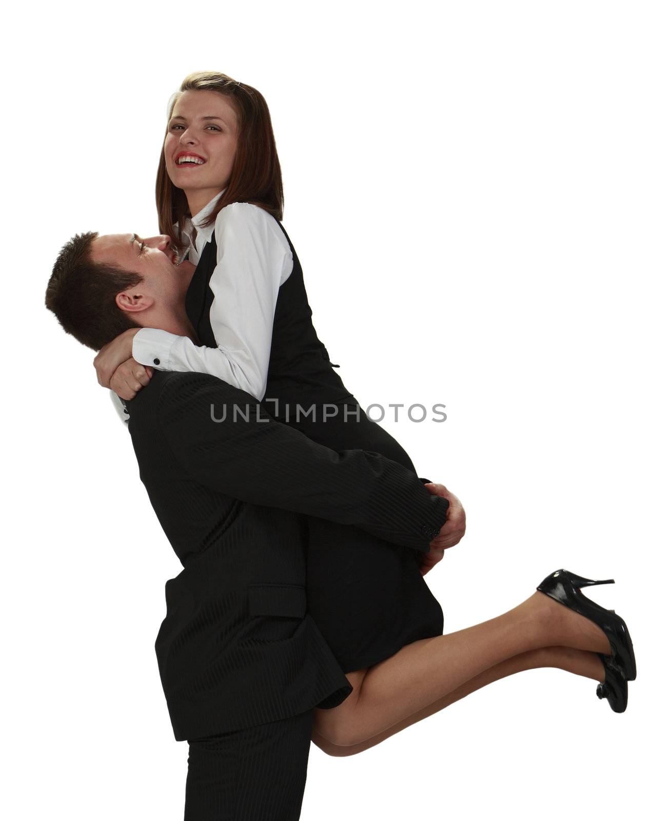 A young man and a woman hugging happily, isolated against a white background.
