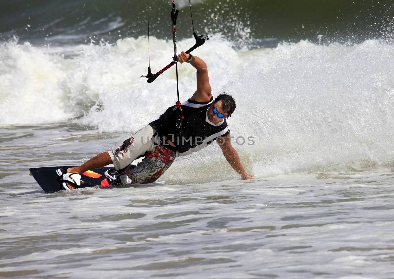 Kiteboarder enjoy surfing in ocean. Vietnam