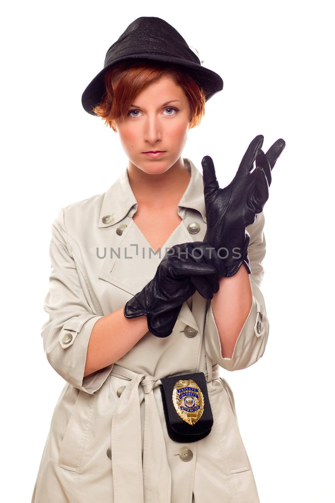 Red Haired Female Detective Putting on Gloves Wearing a Badge, Trenchcoat and Hat Isolated on a White Background.