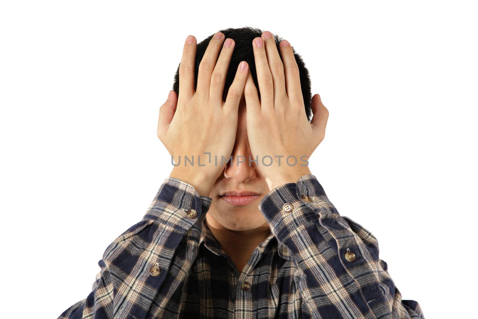 young man cover his eyes