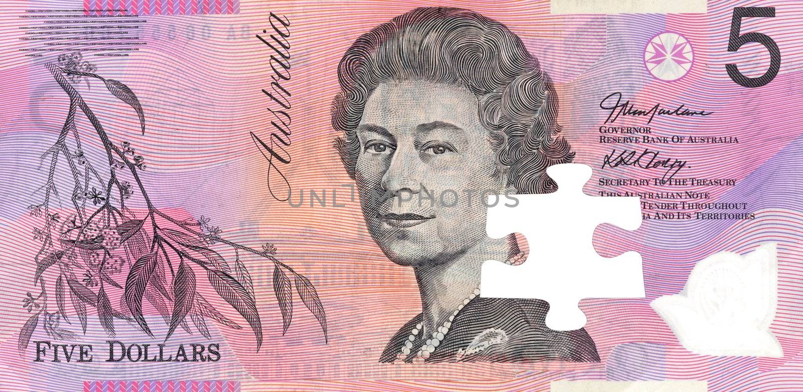 Australian five dollar note isolated against a white background