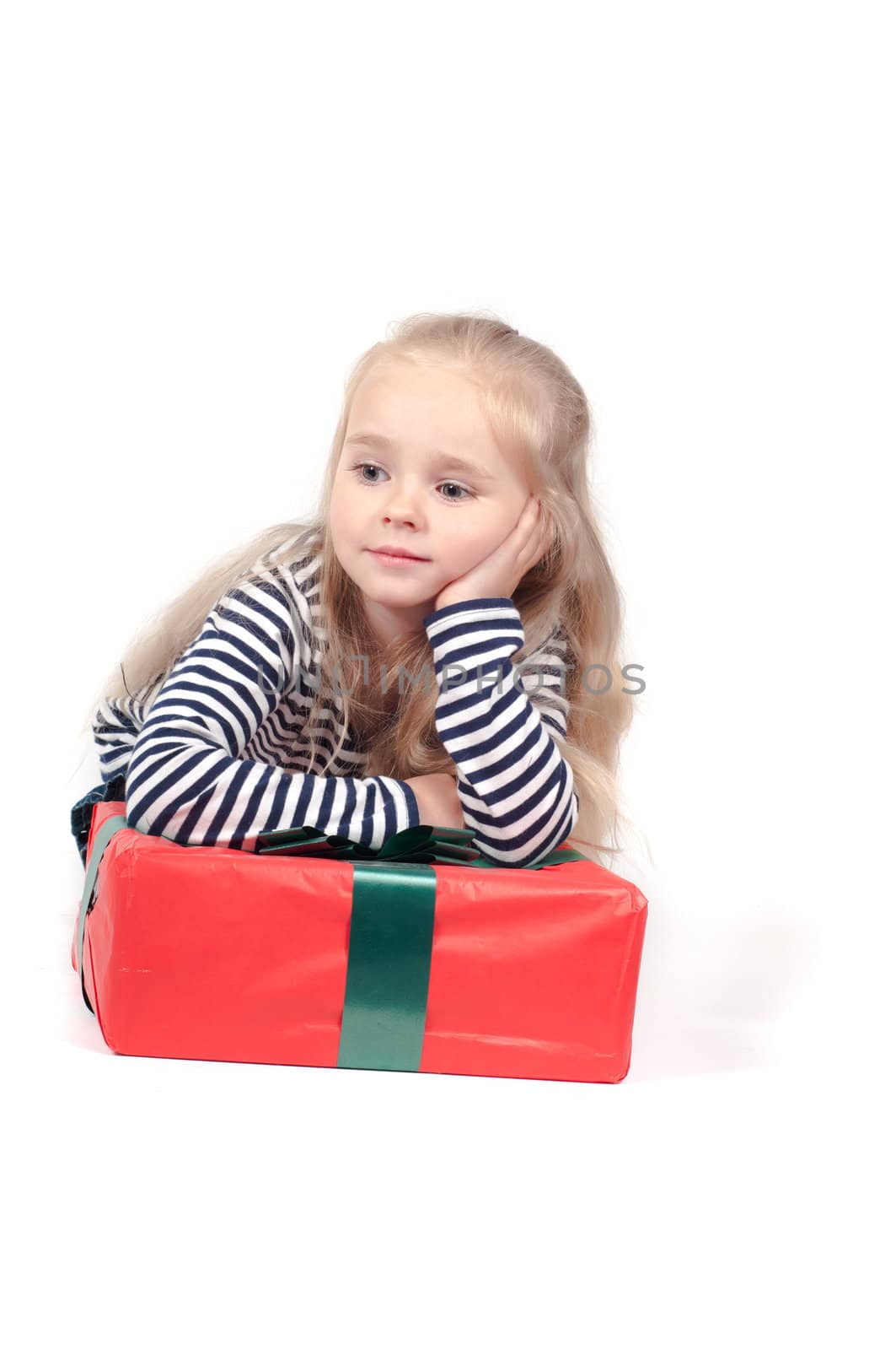 Shot of little cute girl with long hair in studio