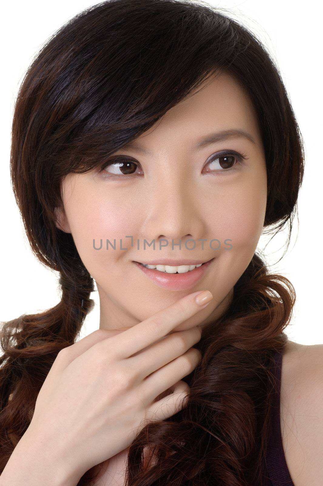 Elegant Asian beauty with smiling expression, closeup portrait.
