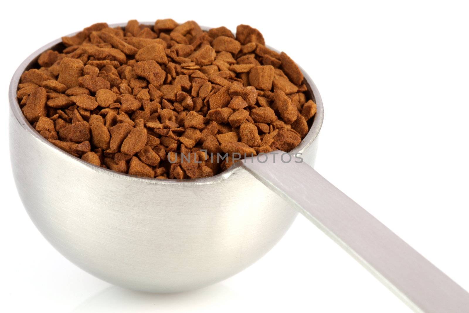 fresh instant gourmet coffee scoop isolated against white background