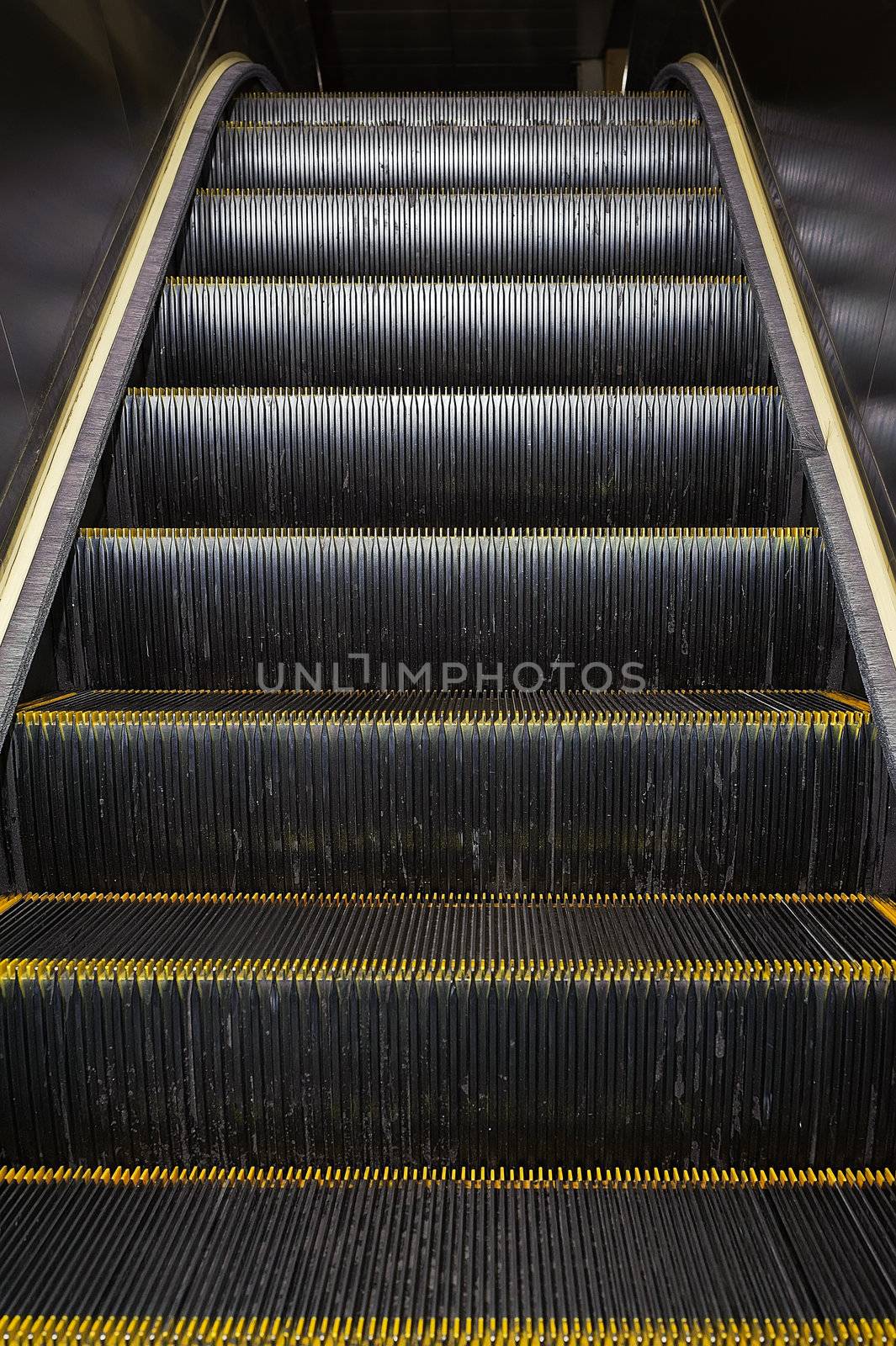 Escalator, closeup image with good metal texture.