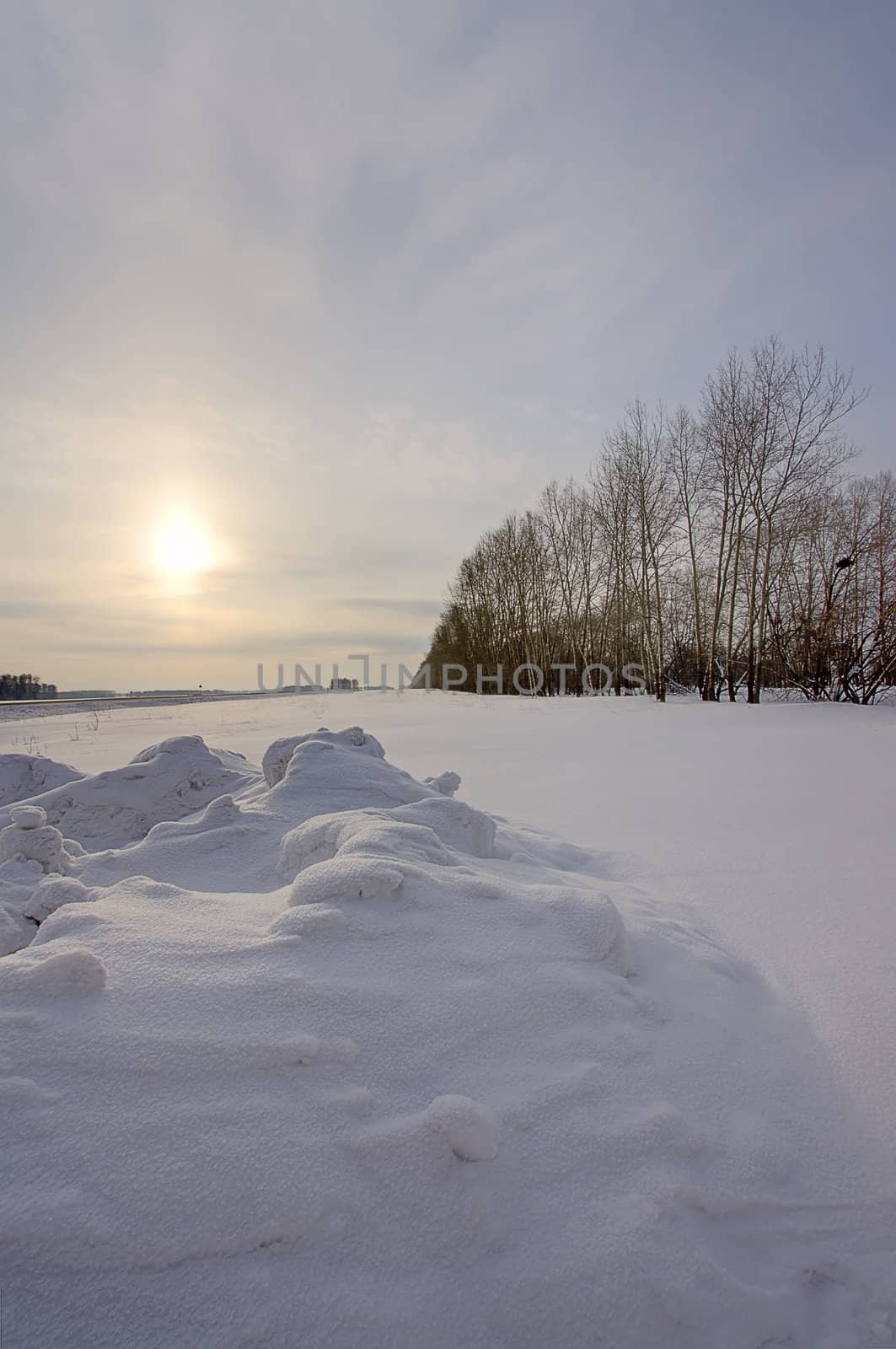 Landscape with snow space and sunset in winter, Russia
