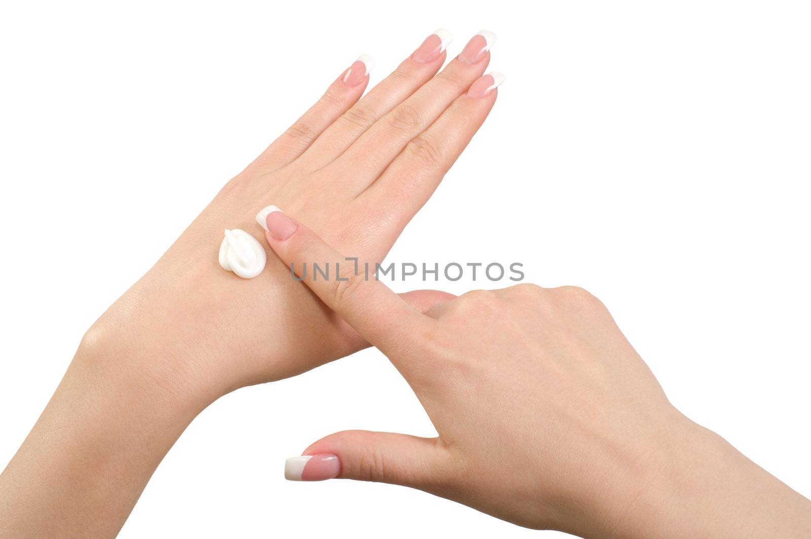 Application of hand cream isolated on white background.