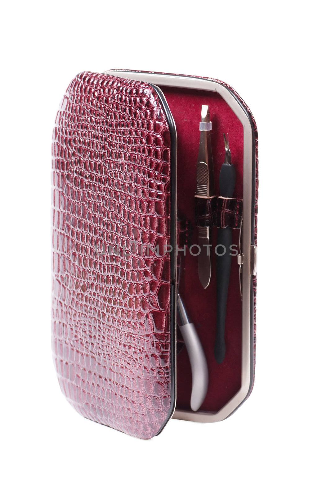 Leather box with manicure set isolated over white