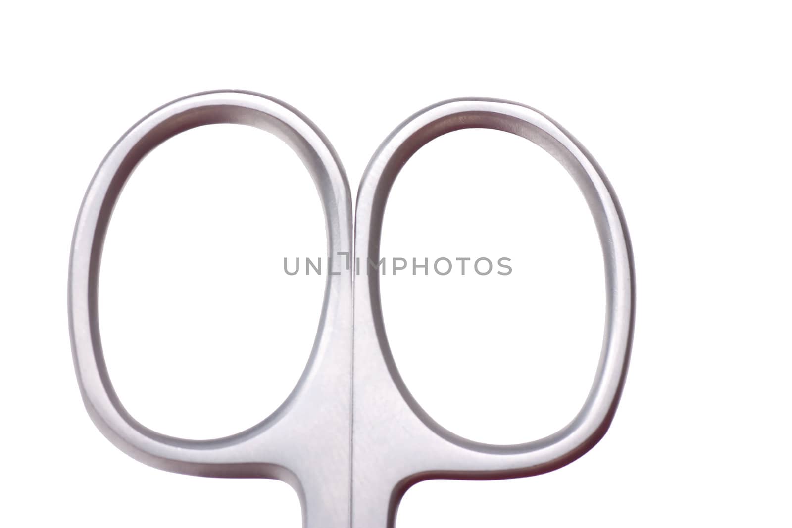 Macro view of handle of scissors isolated over white