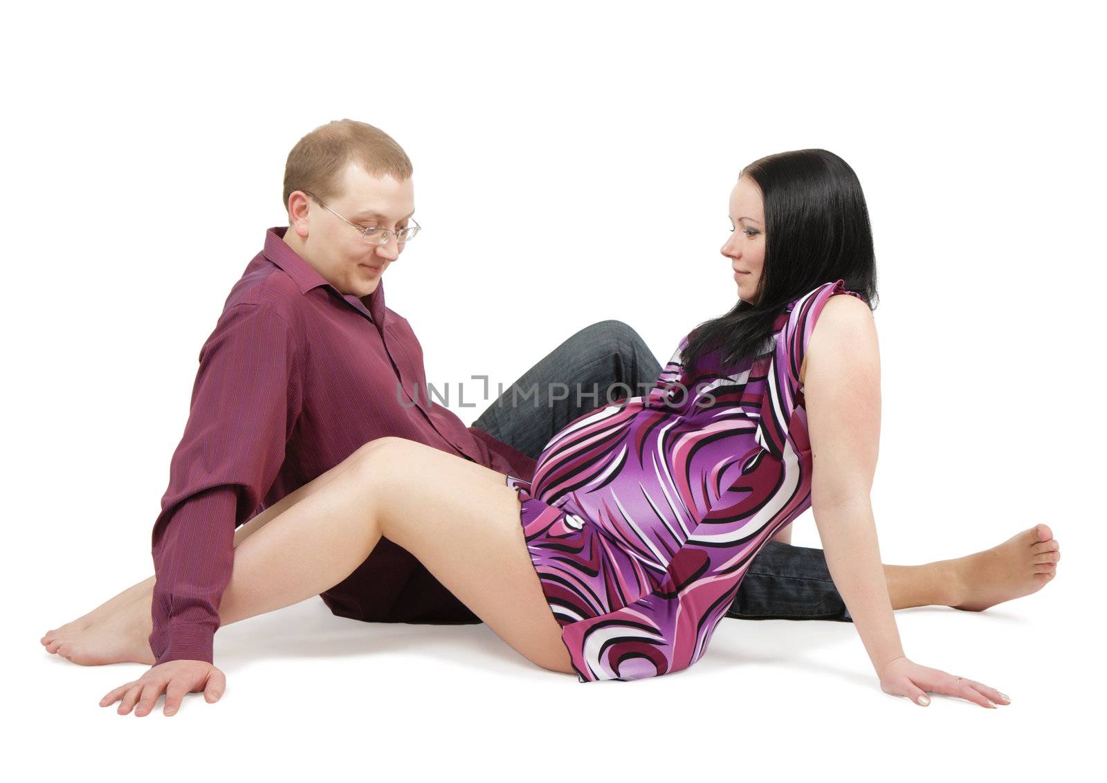 pregnant woman with her husband. The happy couple on white background
