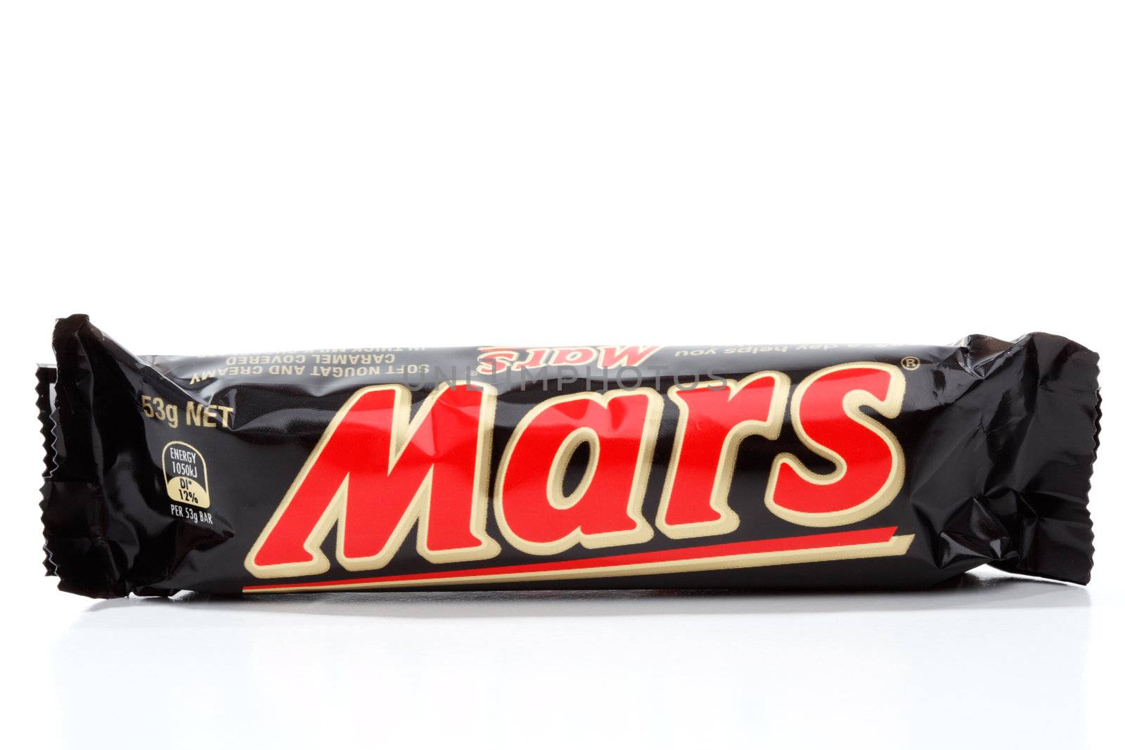 Mars bar, soft nougat, caramel and chocolate coated snack bar.  Manufactured by Mars Inc.  53g   1050kj  White background.  Editorial Use Only.
