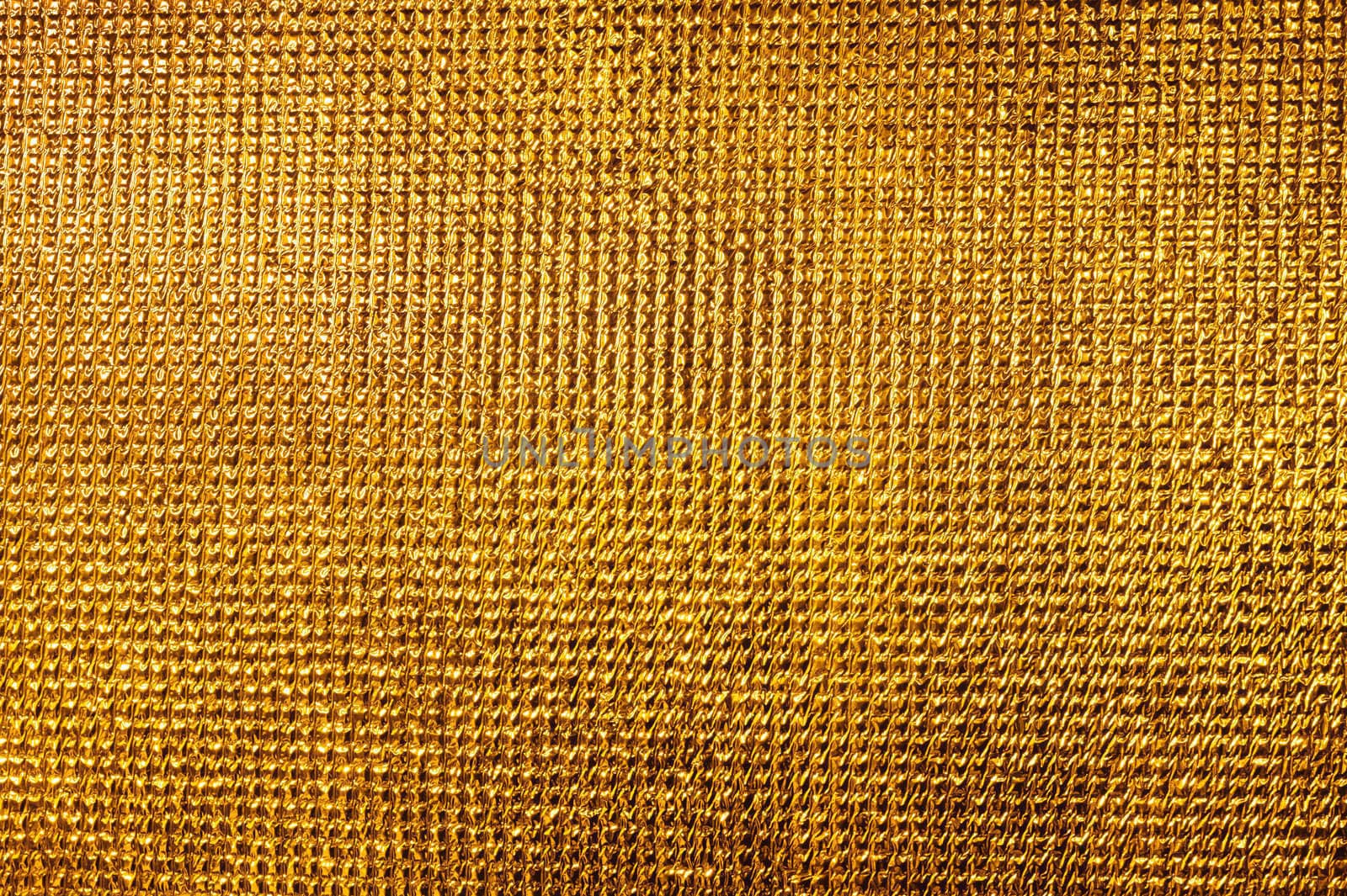 Gold texture. Detailed finely scaly metal surface