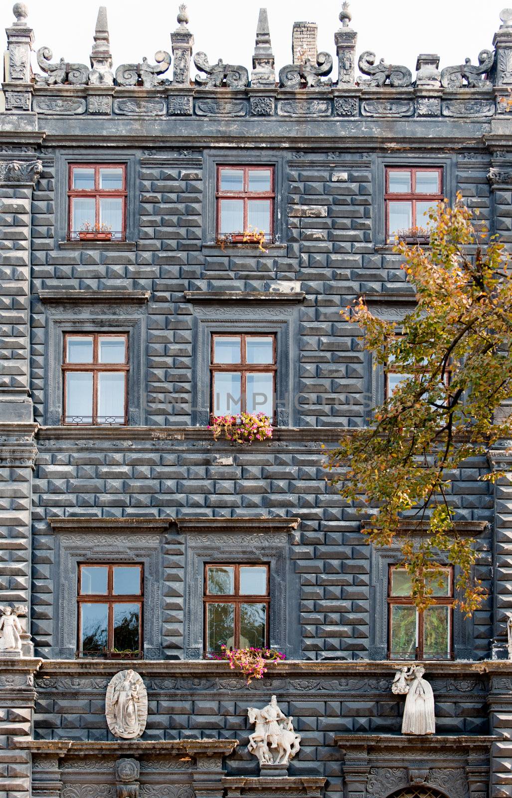 Facade of a building with windows. The building is constructed 1850-1890