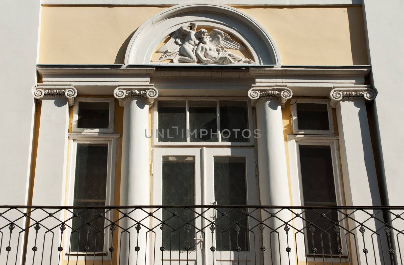 Facade of a building with a balcony. The building is constructed 1850-1890