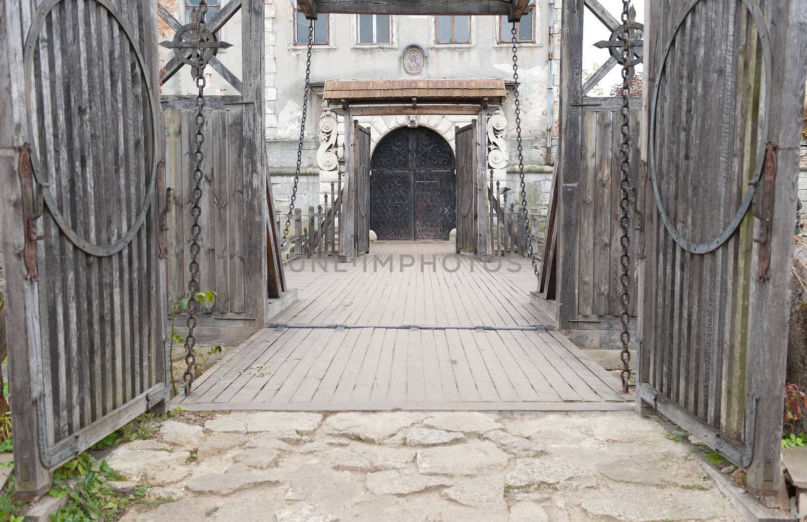 Input and suspension bridge in old castle. Lvov, Ukraine