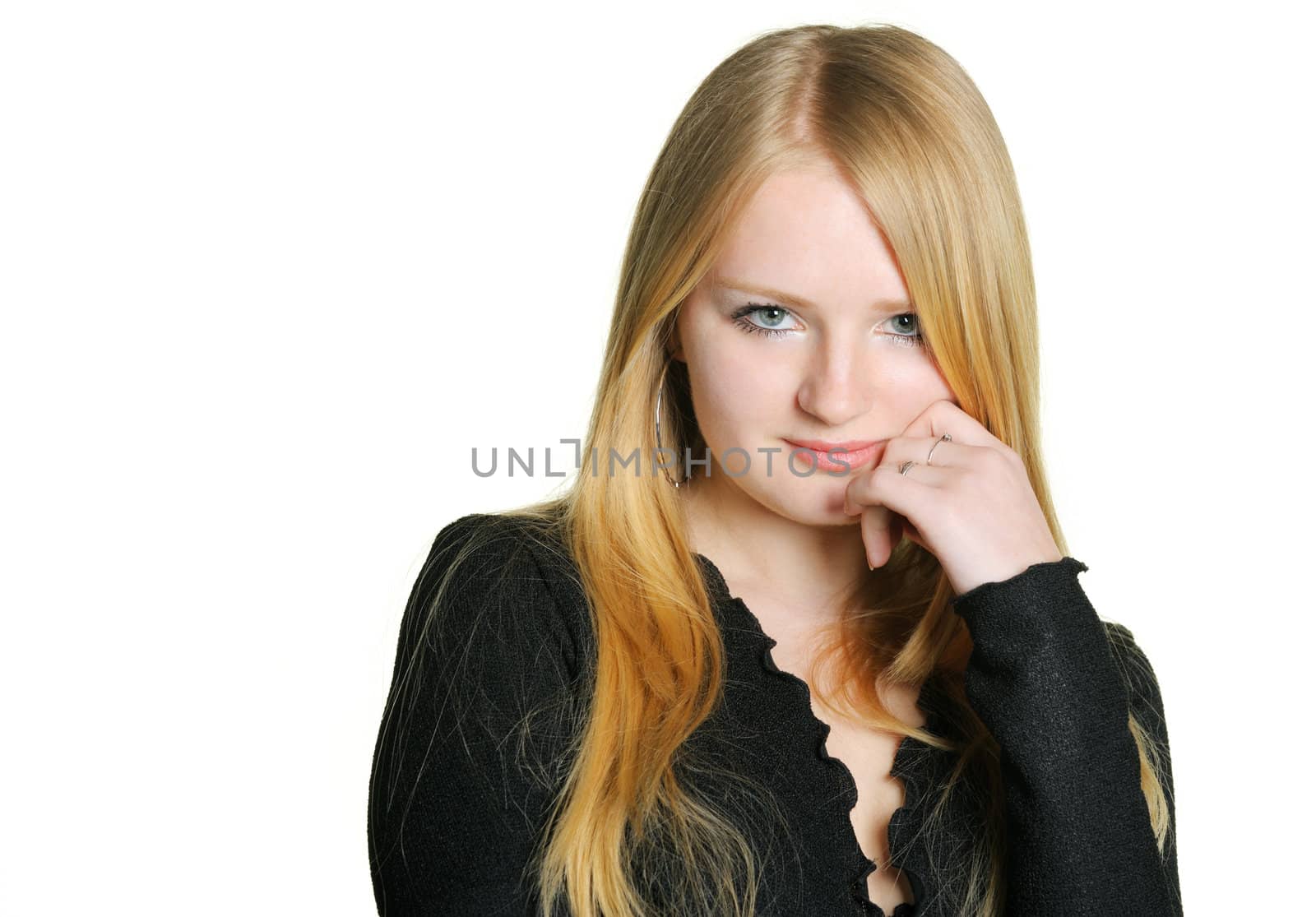 Portrait of the pretty young girl of the blonde. On a white background
