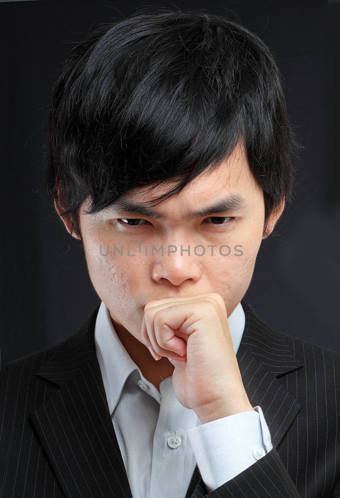 asian man thinking