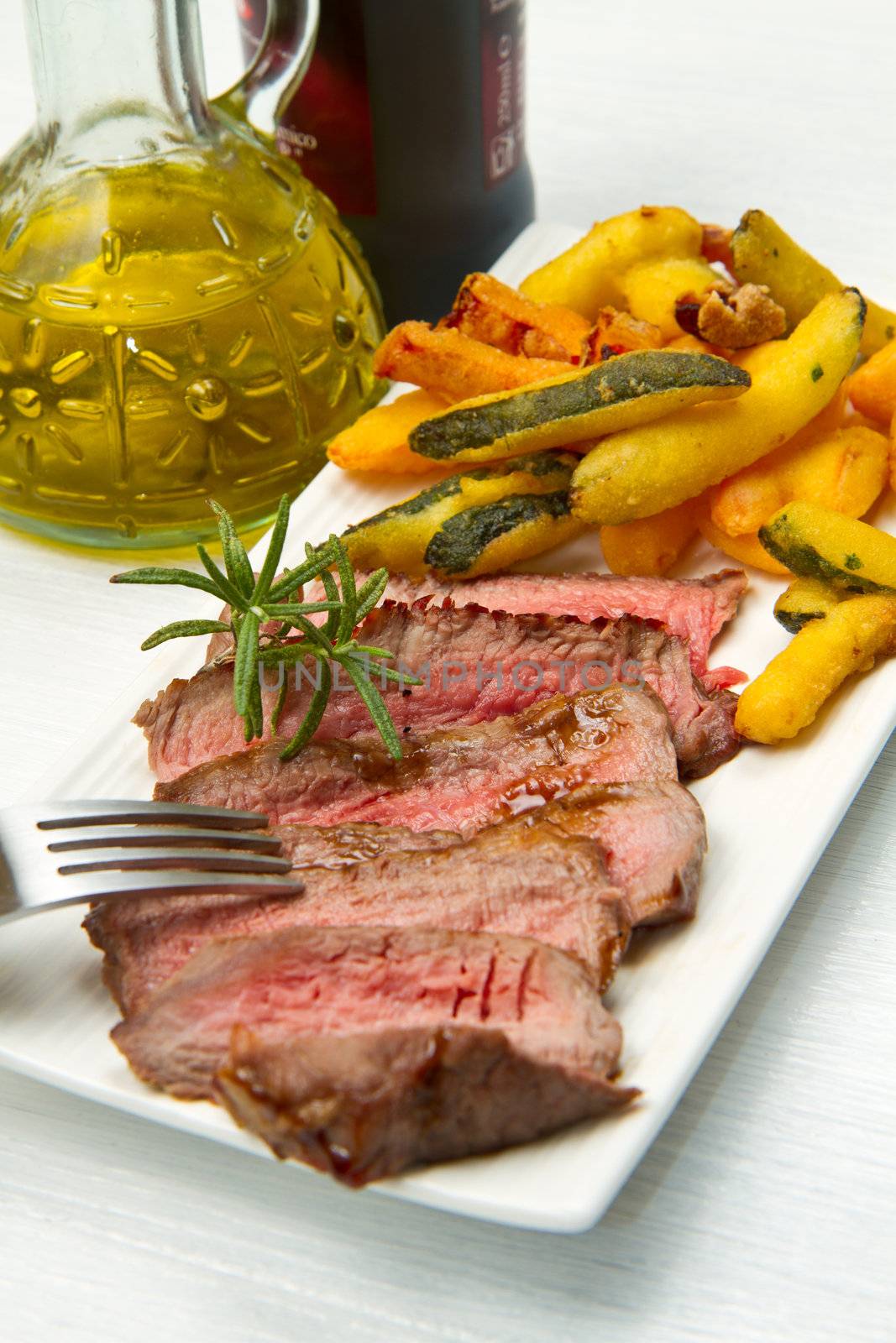 meat grilled with fried vegetables