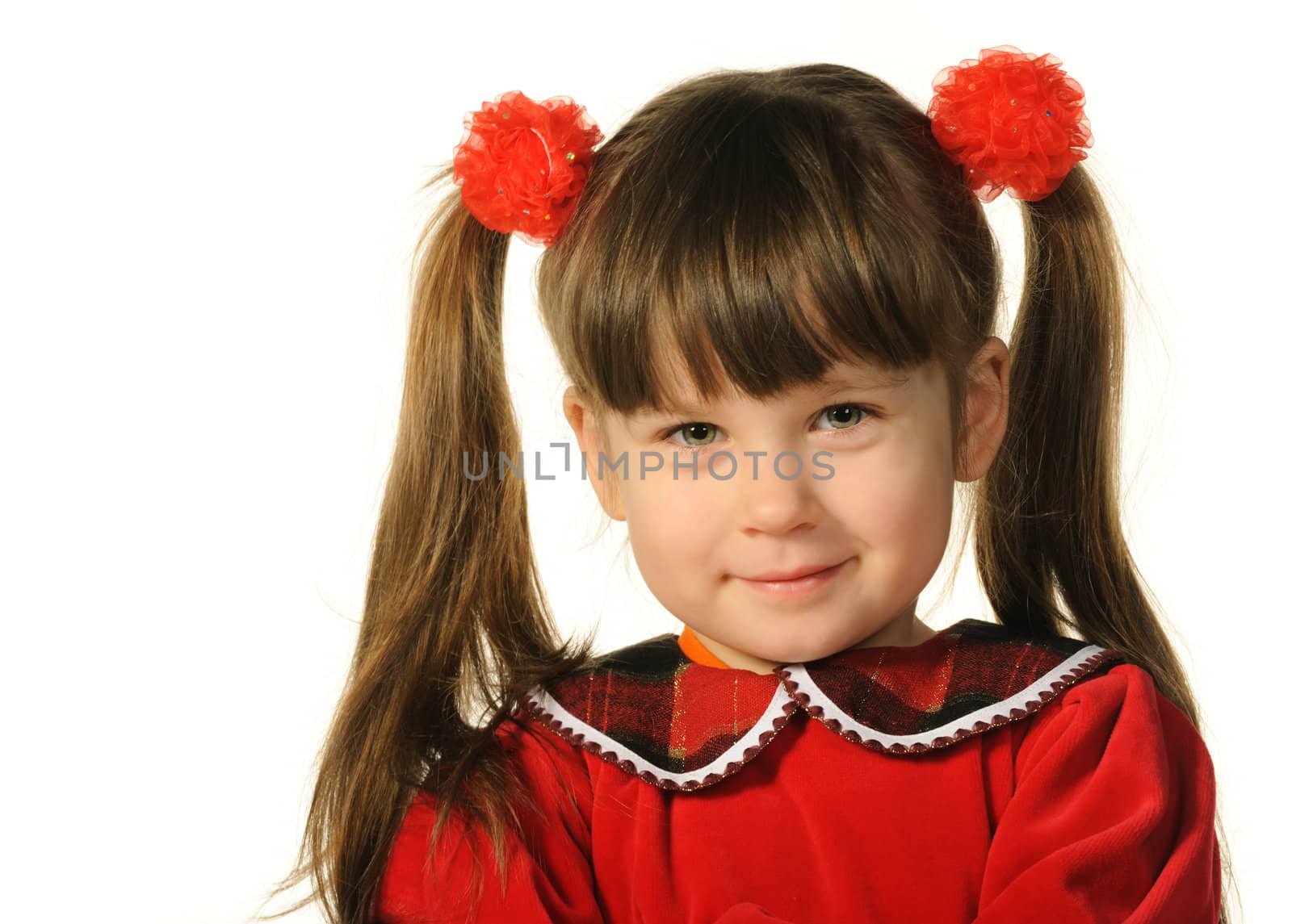 Portrait of the pretty little girl. It is isolated on a white background