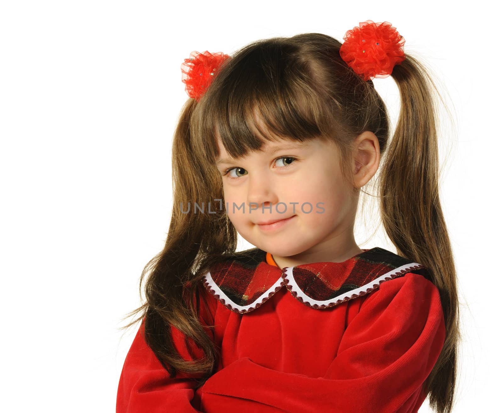 Portrait of the pretty little girl. It is isolated on a white background