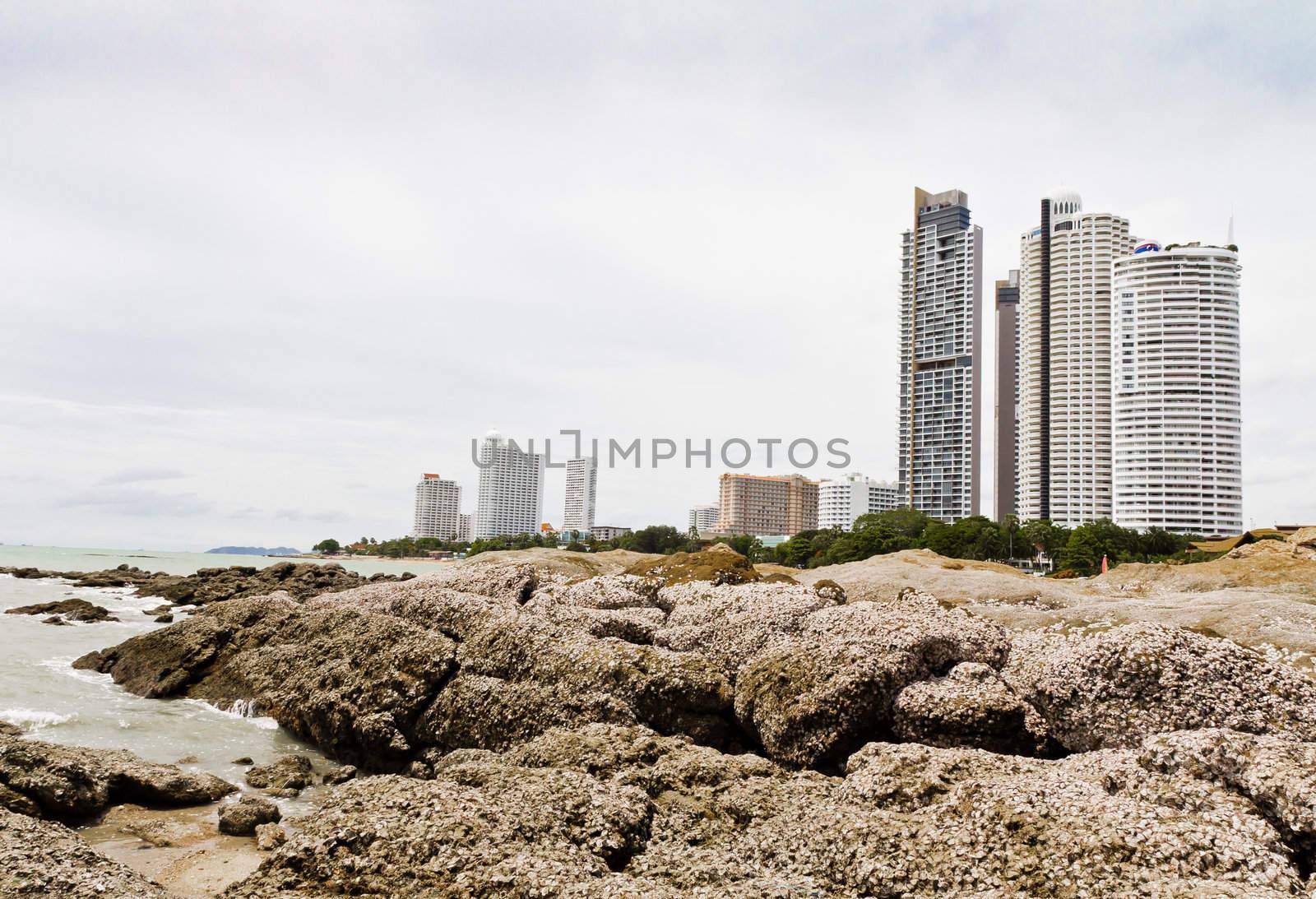 Modern hotel beside the beach, rocky beach by Na8011seeiN