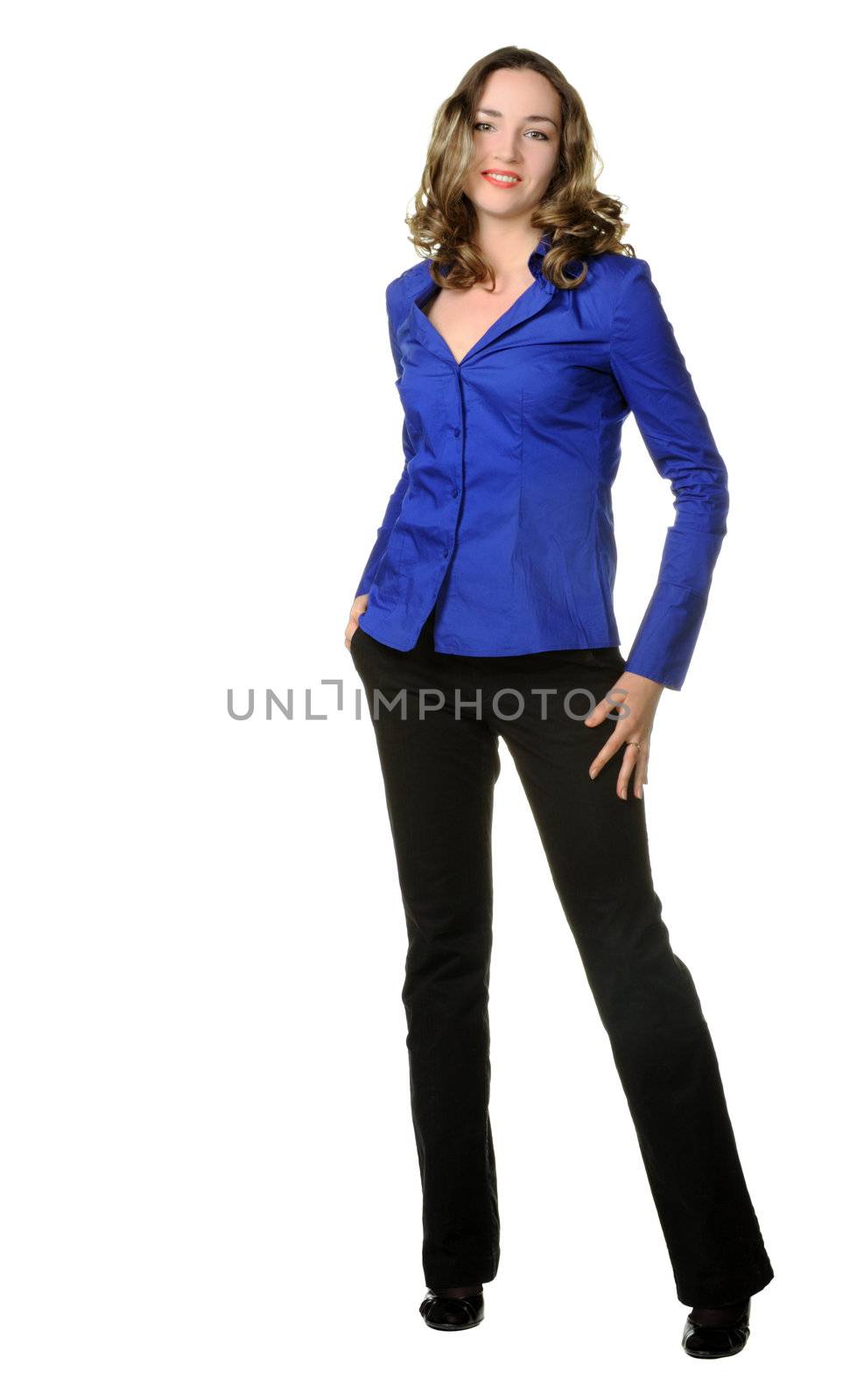 The attractive girl in trousers and dark blue shirt. It is isolated on a white background