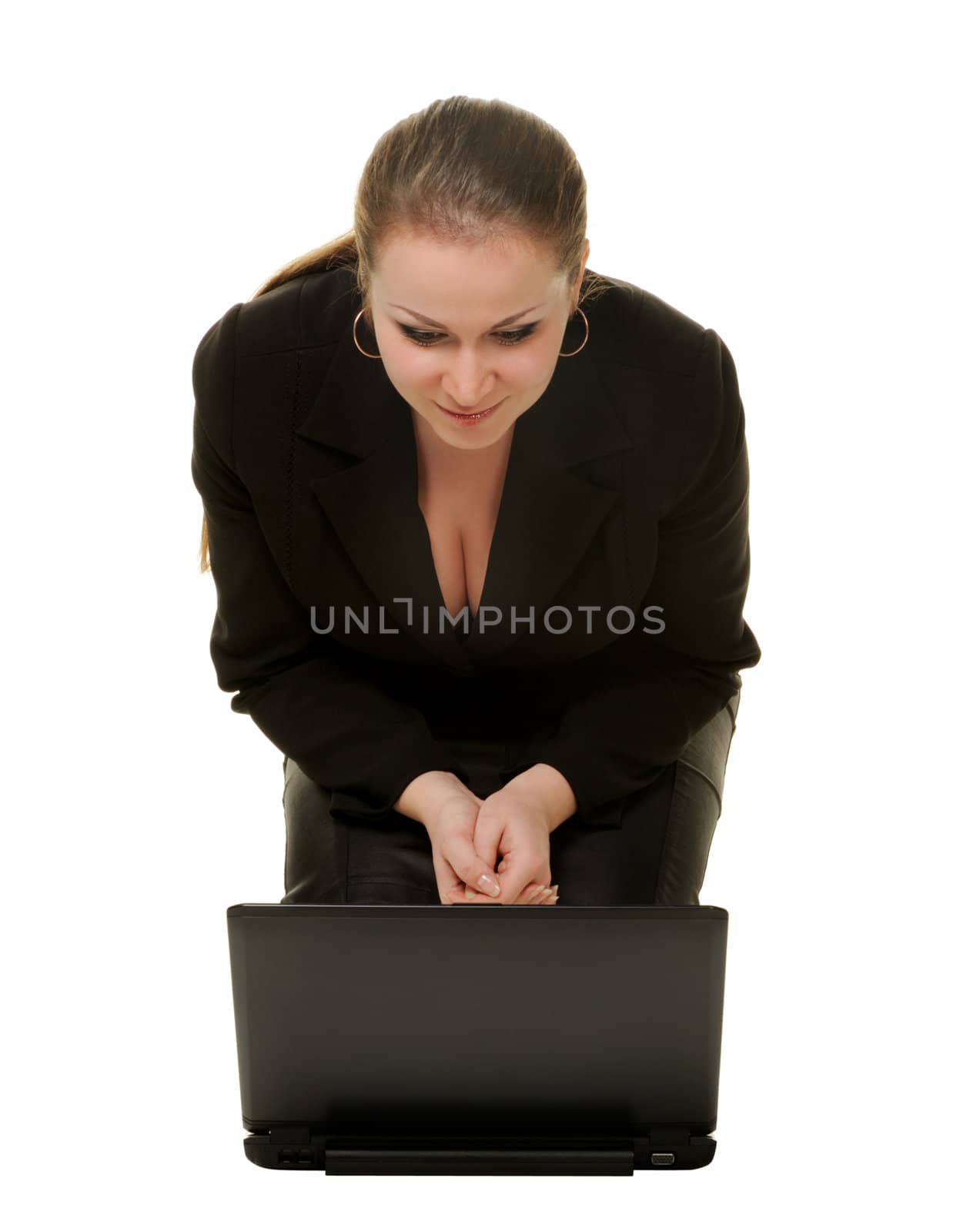 The woman before laptop. It is isolated on a white background.