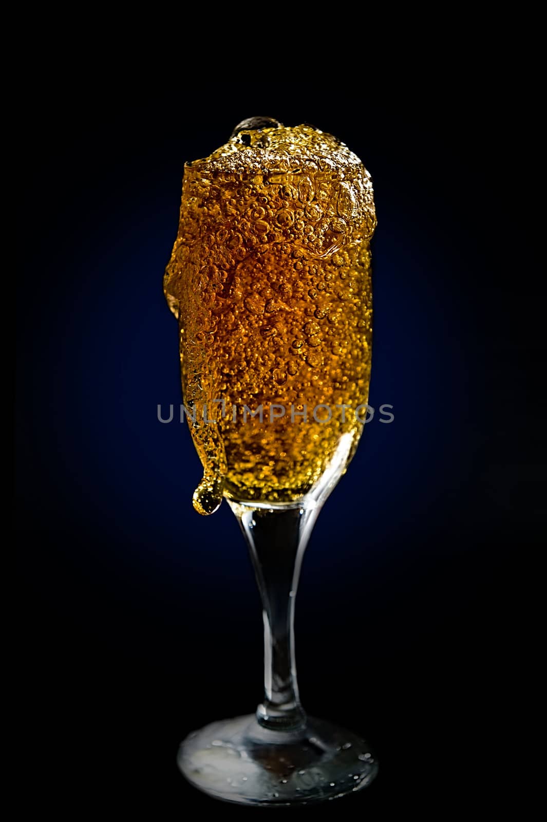 Goblet with sparkling drink by Aleksandr