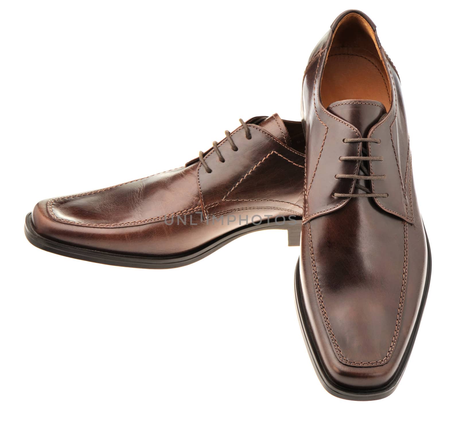 Pair a shoe a brown leather. Man's shoes isolated on a white background